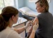 Adult receiving MMR vaccine injection in clinic