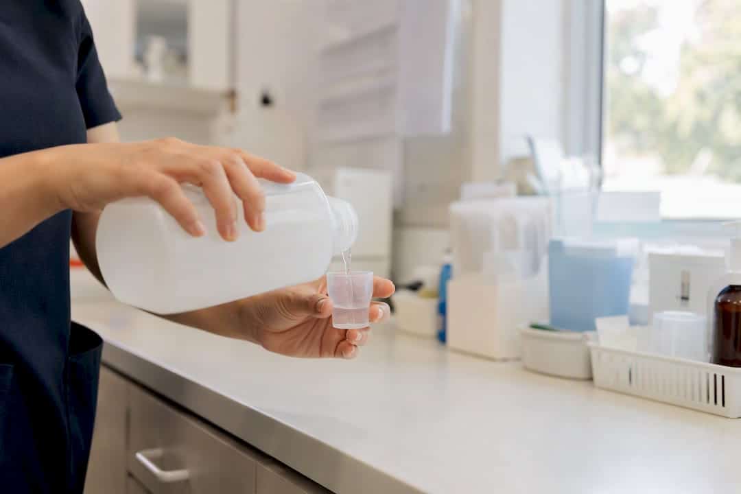 Nurse pouring oral rehydration solution