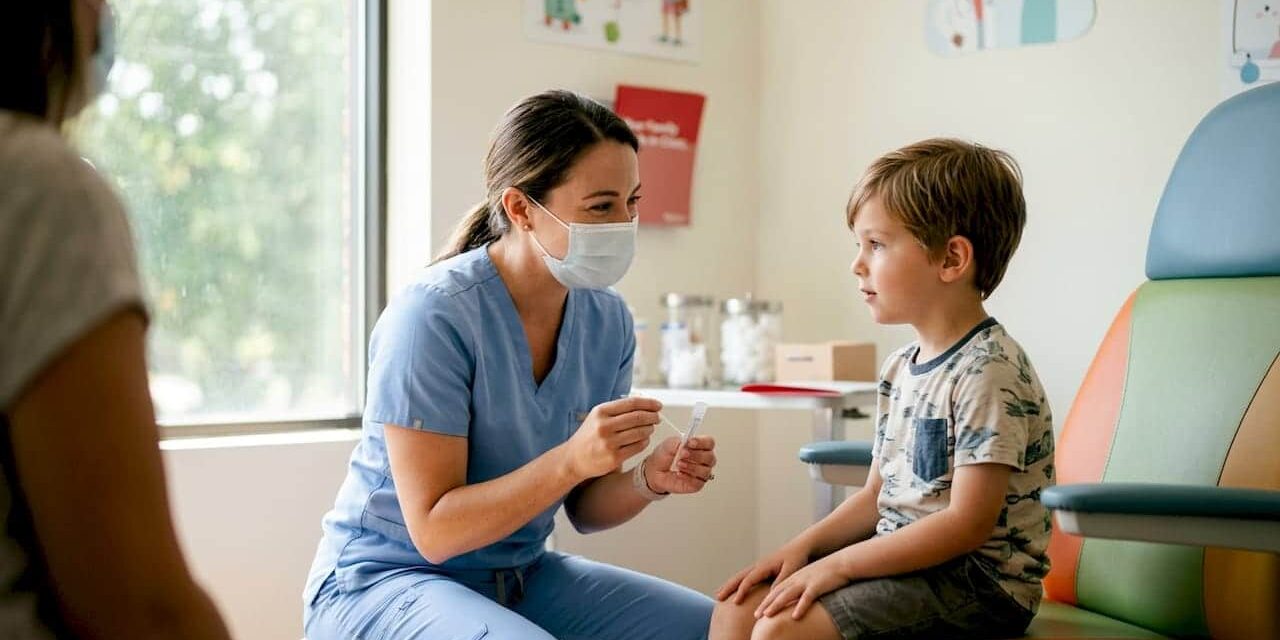 Healthcare worker administering nasal swab test in clinic