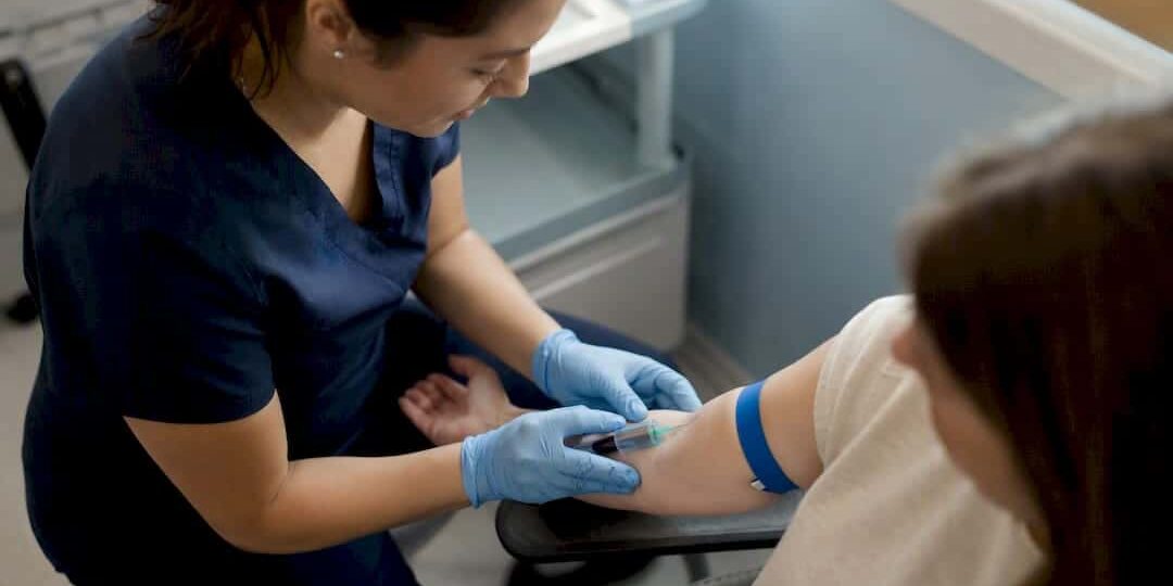 1787582500613_Nurse-drawing-blood-for-herpes-test Nurse drawing blood for herpes test