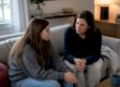 Parent listening to teen at home