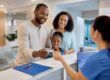 Member checking in at urgent care reception