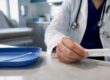 Clinician reviewing rapid flu test result