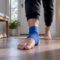 Person testing weight on injured ankle