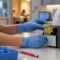 Clinician preparing an urgent care urine test