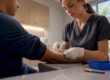 Clinician applying a TB skin test