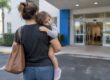 Parent bringing child with fever to clinic