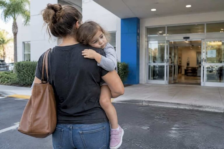 Parent bringing child with fever to clinic