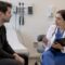 Patient discussing STI test timing with clinician
