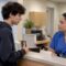 Teen asking clinic staff about insurance privacy