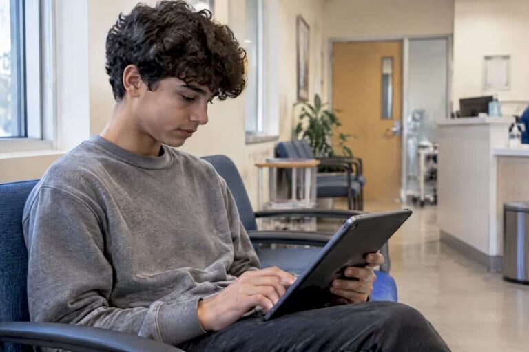 Teen completing a depression screening questionnaire