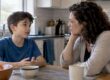 Mother listening as child talks at home