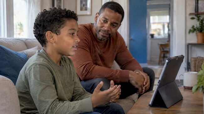 Child speaking during virtual counseling at home
